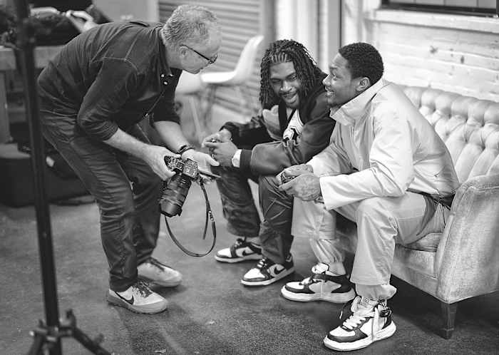 Stefon and Trevon Diggs talk with photographer Simon Bruty